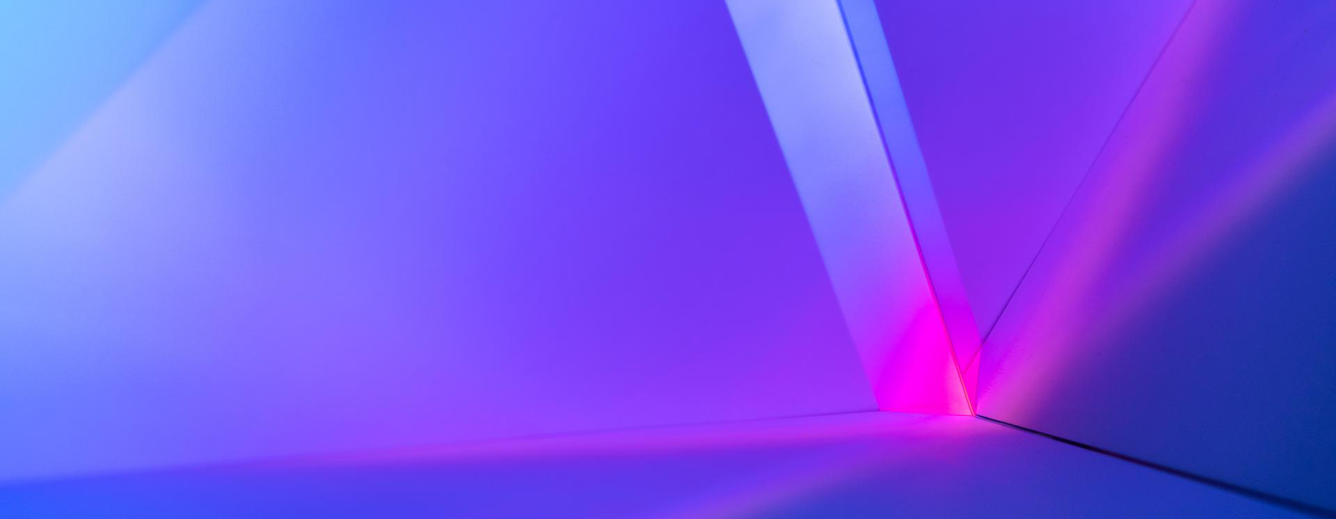 Purple and pink abstract image of an arrow