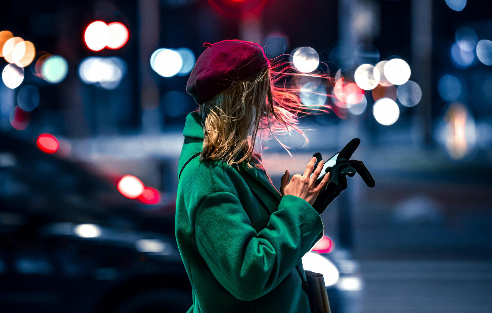 female looking at phone