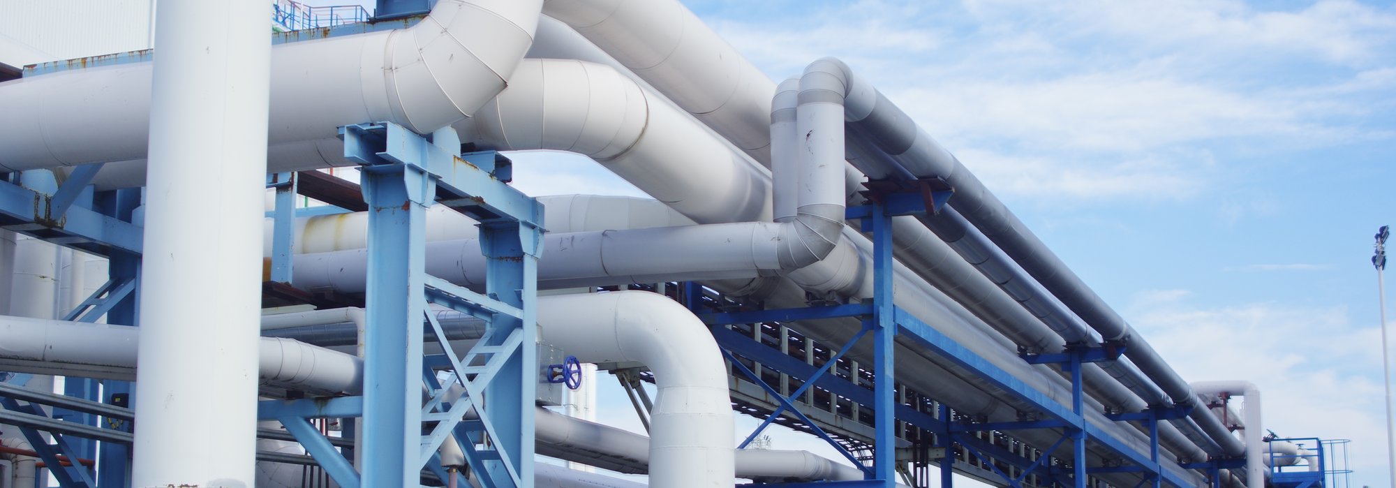 Pipelines at factory and blue sky