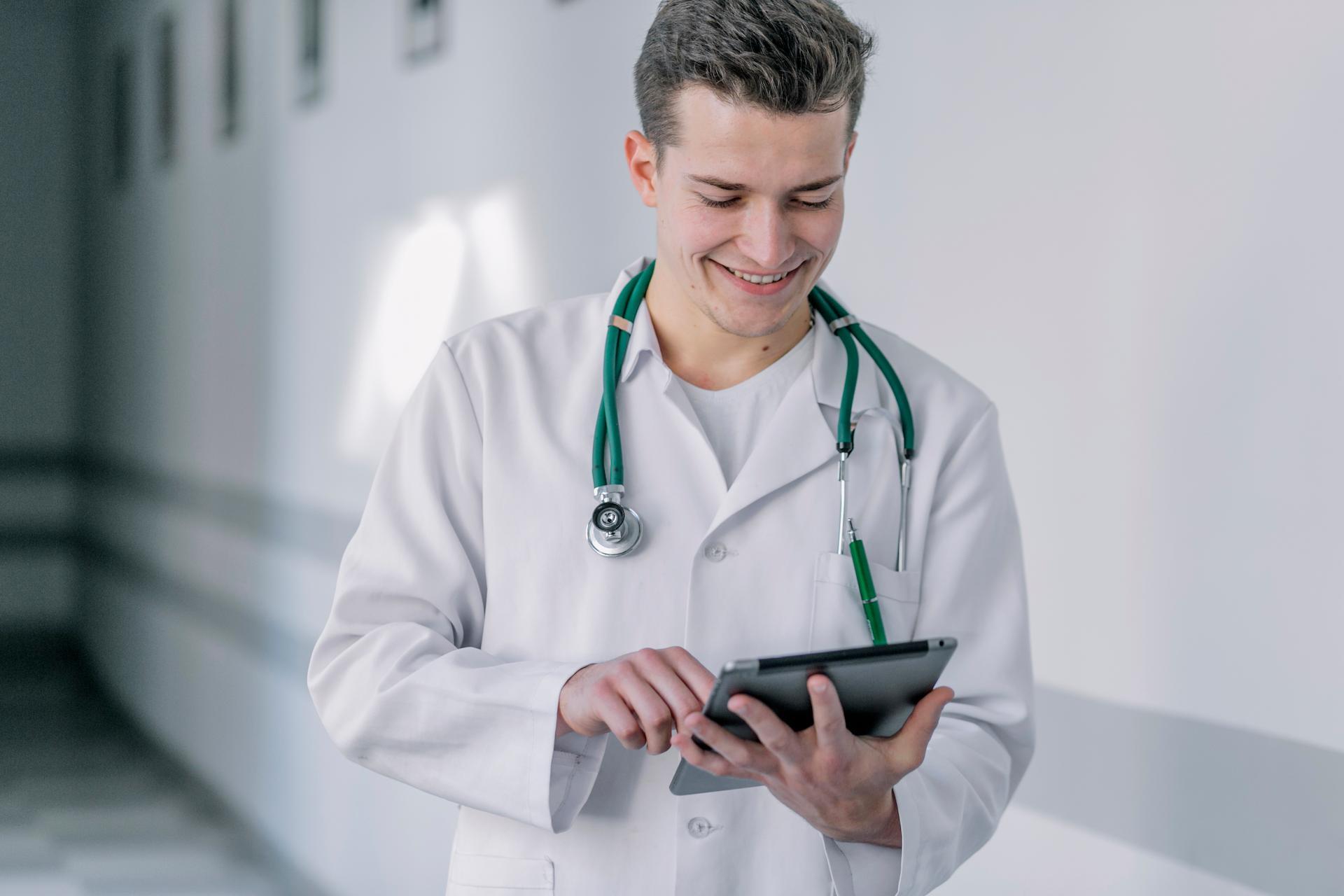 male doctor using tablet