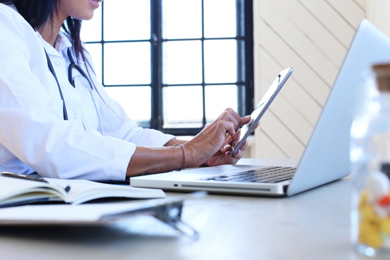 doctor-wearing-white-robe-stethoscope-1280x853