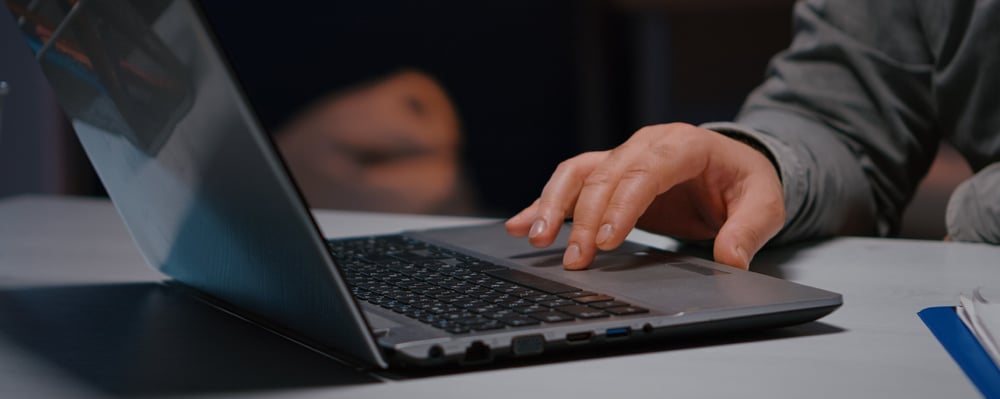 man_laptop_hand_closeup-1