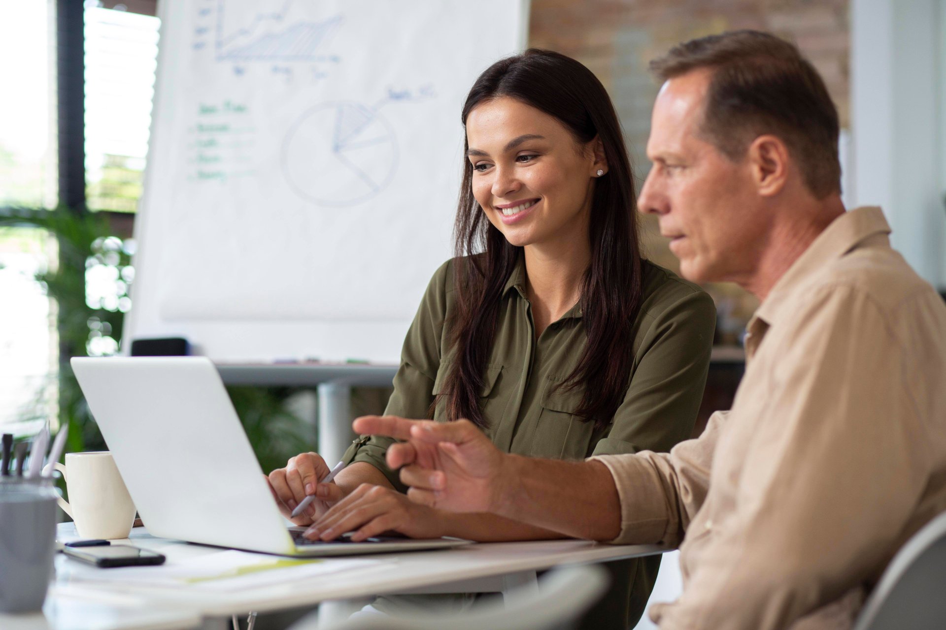 people-using-digital-device-while-meeting