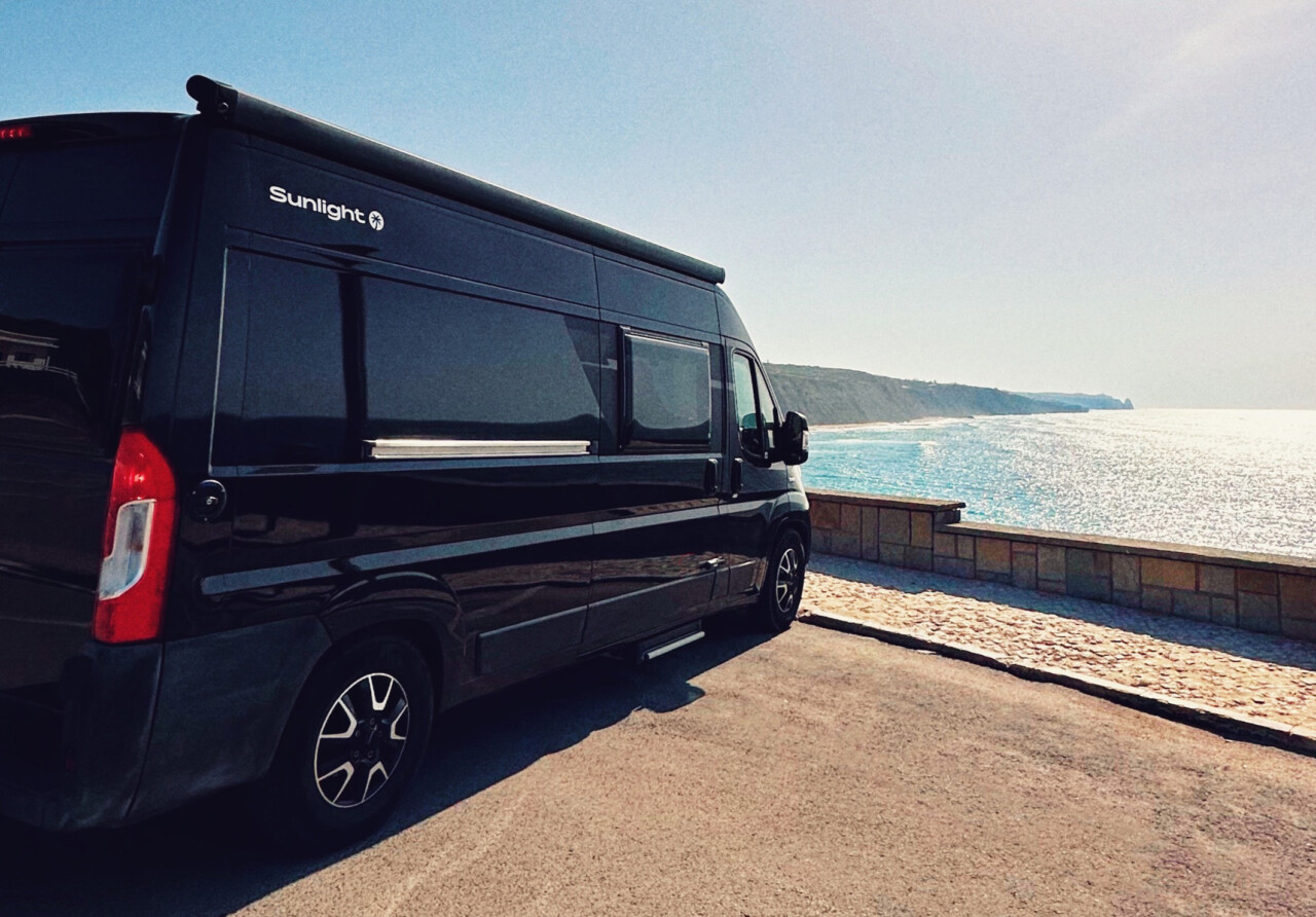 van parked by the sea