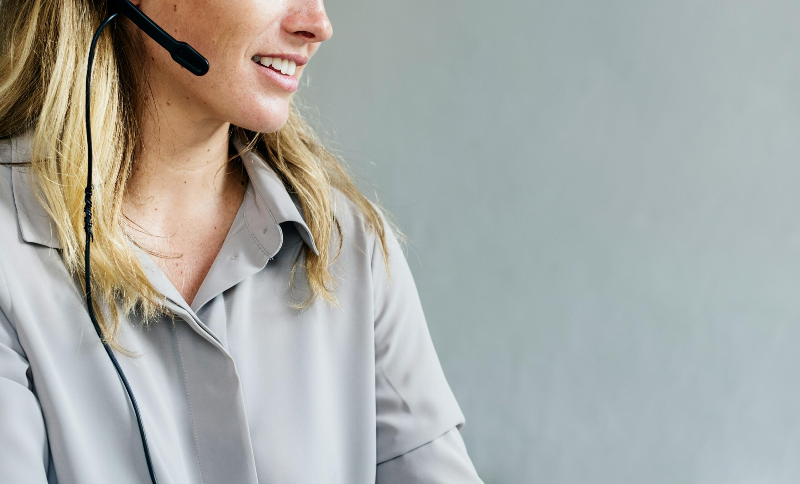 Woman talking to a head-set