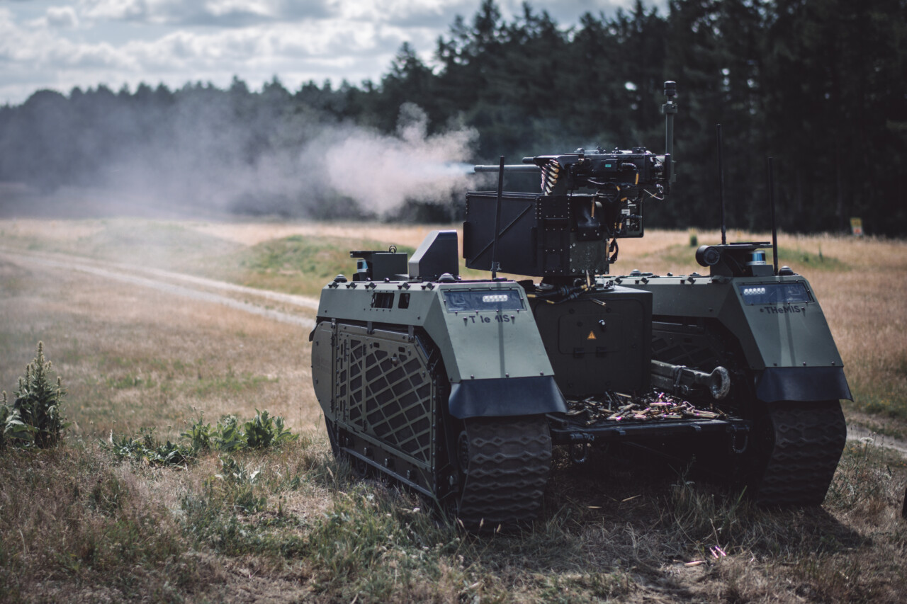 Unmanned ground system shooting on a field